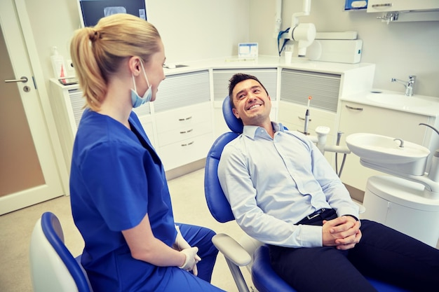 A laughing gas dentist preparing a patient to receive laughing gas for a procedure.