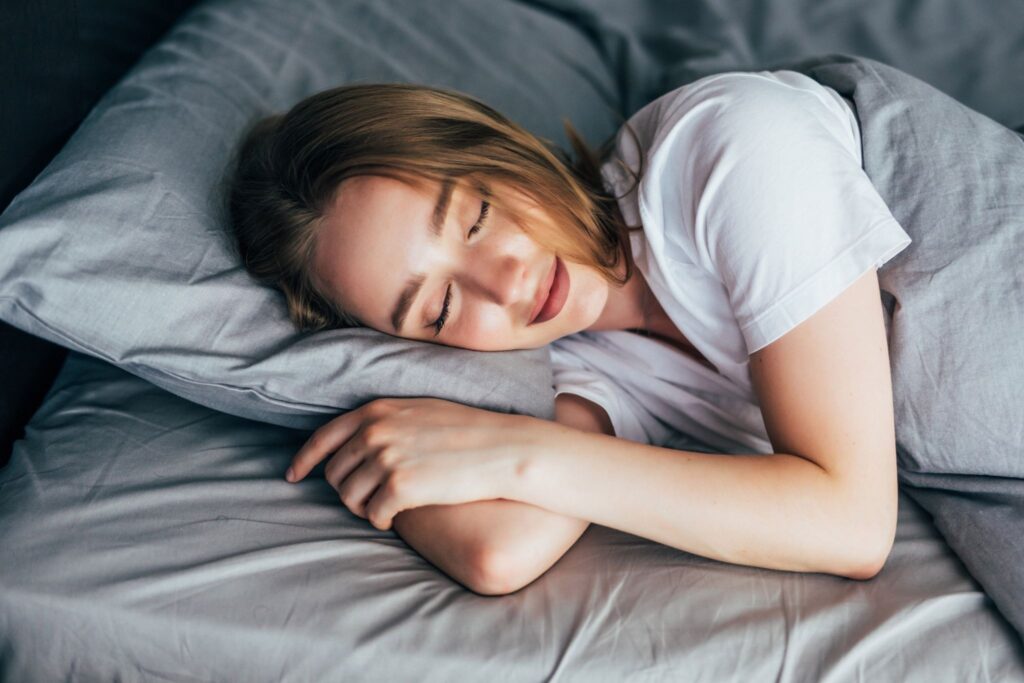 Resting woman showing results of simple snoring remedies. We were able to answer her questions, such as: "Why do people snore?" and "What causes snoring?"