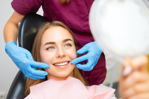 A cosmetic dentist near you, enhancing a patient's smile for a more confident, brighter look.