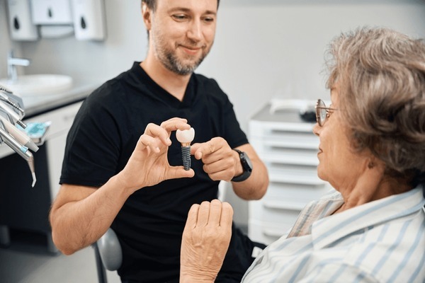 A patient having a dental implant consultation near you.